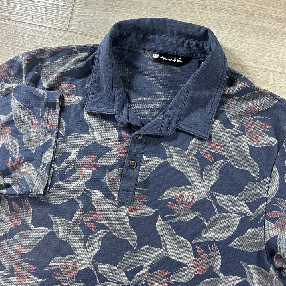 TravisMathew Polo Shirt‎ Mens L Blue Floral Hawaiian Golf Performance Collared